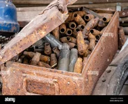 rusty-old-rusty-metal-box-with-ammunition-2C9BYXE.webp